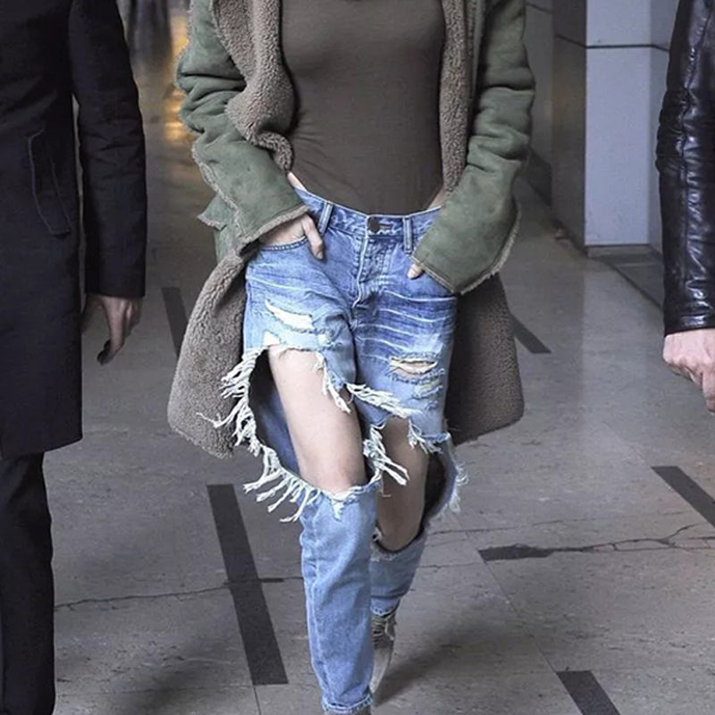 Personality knee big hole tassel edge nine feet pants tide